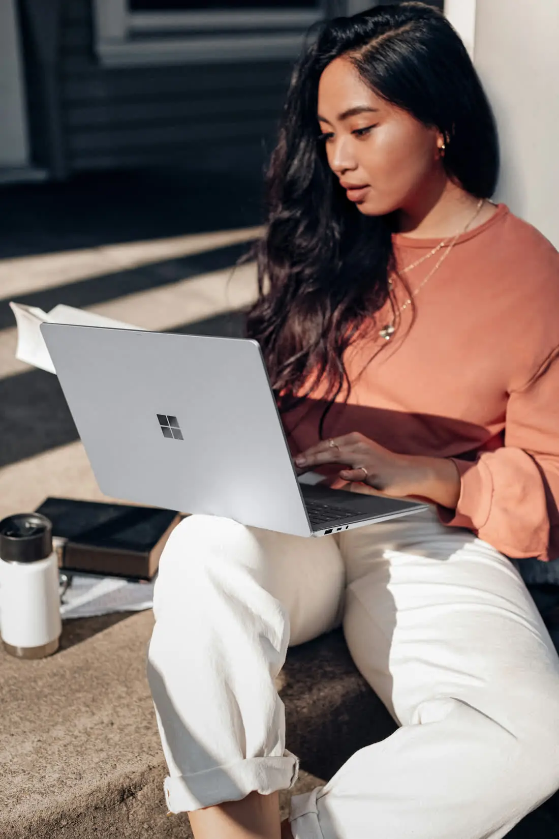Professional using AI email assistant on their device
