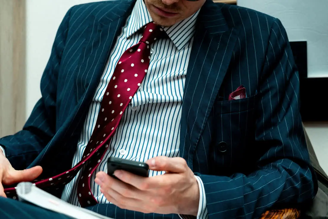 Professional using AI email assistant on their device